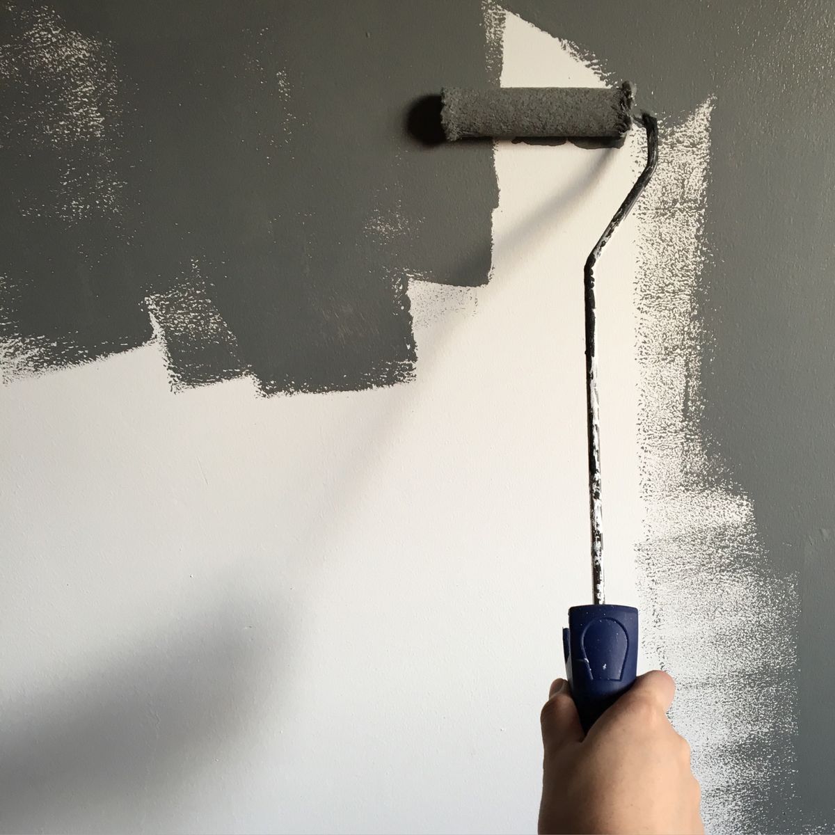 An interior wall being painted